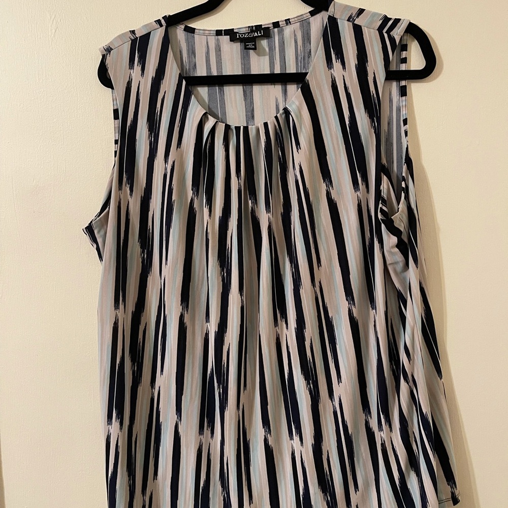 Plus size multicolored striped shirt.
